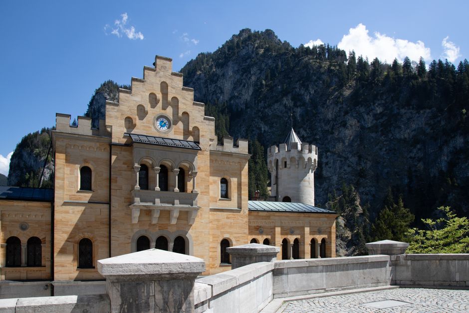 View of Neuschwanstein Castle with mountains in Schwangau, Bavaria, Germany.