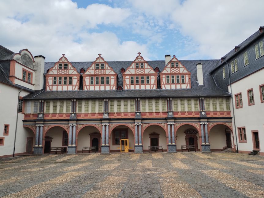 View of the historic courtyard in Schloss Braunfels, Germany, showcasing classic architectural styles.